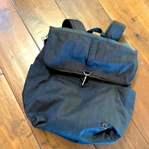 Lululemon black and gray backpack with chrome hardware